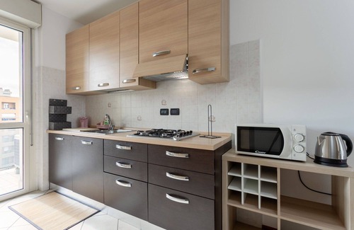 Milan Apartment | Futurismo, Large 2 Br Apartment Near Trapezio Park By Halldis