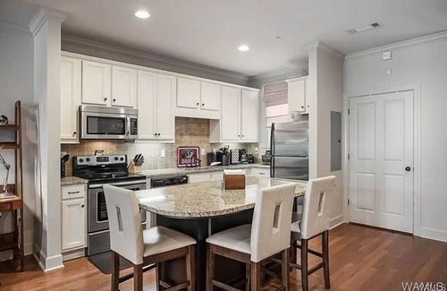 The Strip Condo | Game Day Condo right on the strip. Walking distance to Bryant Denny Stadium!