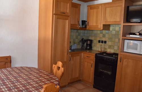 Pralognan-la-Vanoise Apartment | Garden Apartment in Chalet, Near Ski Lifts and Shops, Shared Laundry, Pet-Friendly