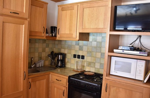 Pralognan-la-Vanoise Apartment | Garden Apartment in Chalet, Near Ski Lifts and Shops, Shared Laundry, Pet-Friendly