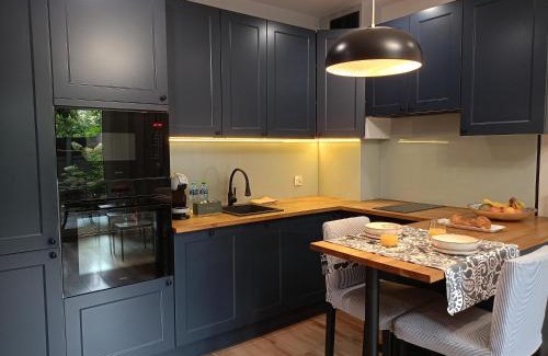 Grudziadz Apartment | Garden Haven