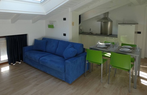 Riva del Garda Condo | Garden Pool Residence Villa degli Aranci-Attic apartment-100 from the beach