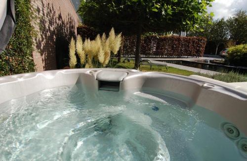 Teteringen Ski Chalet | Gardenhouse with private jacuzzi & private sauna