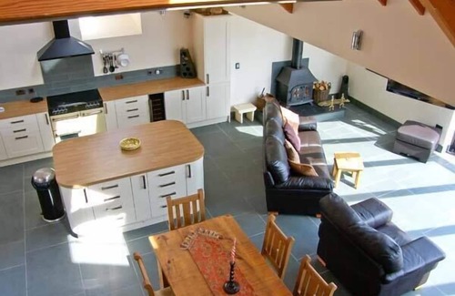 Porthmadog Cottage | GARTH MORTHIN THE BARN, pet friendly, with open fire in Porthmadog