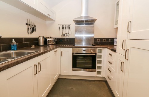 Porthmadog Cottage | GARTH MORTHIN THE STABLES, pet friendly, with open fire in Porthmadog