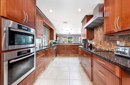 Northeast Miami Villa | Gated Private Acre 5BR4BA Tropical Villa w/Theater