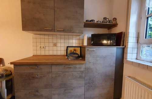 Schwanfeld Apartment | Gemütliche 60qm Ferienwohnung mit Terrasse, voll ausgestattete Küche