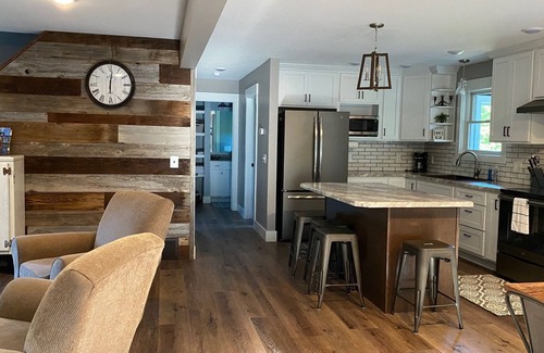 Traverse City House | Get away to the Traverse City area, private setting great location.