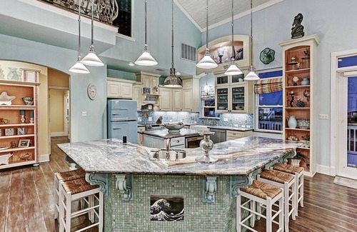 San Luis Beach House | Get the best of both worlds, beach & bay, in this luxurious waterfront home.