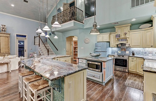 San Luis Beach House | Get the best of both worlds, beach & bay, in this luxurious waterfront home.