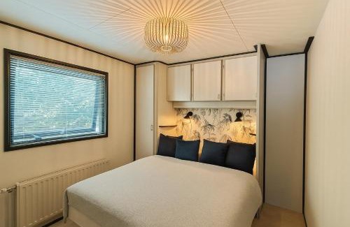 Erm House | Gezellig chalet met 2 slaapkamers aan bosrand