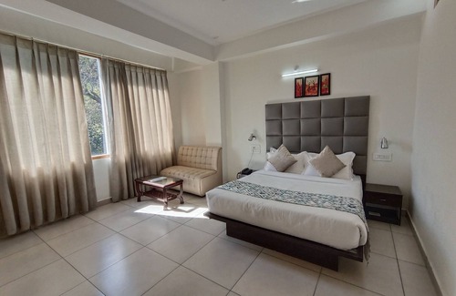 Bandrol Hotel | Gezellig Inn Oasis