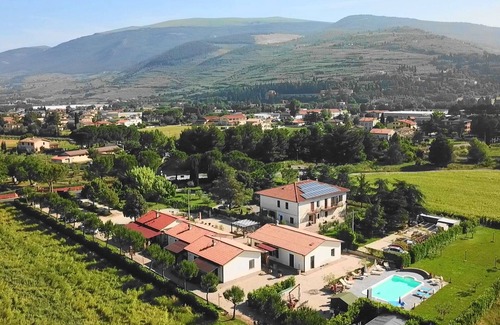 Spello House | Ginepro apartment in a holiday home with park and swimming pool