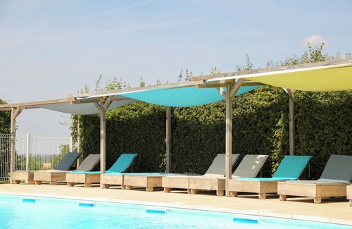 Jayac RV Rental | Glamping 'Safarilodge Confort Tent 8 5 Pers' with Shared Pool, Private Terrace and Wi-Fi