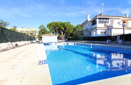 Playa de Almarda Ski Chalet | Global Properties: Townhouse on the beach with pool