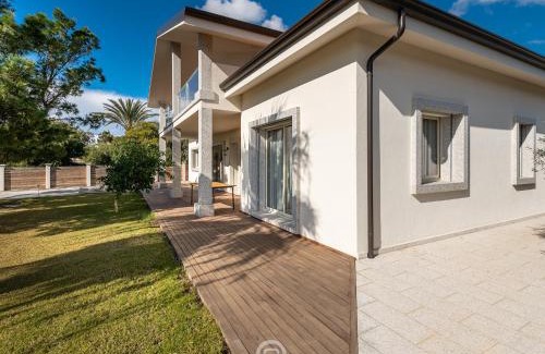 Porto Pino House | Golden Dunes Villa - Garden Retreat