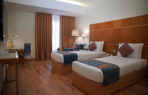 Muscat Hotel | Golden Tulip Muscat