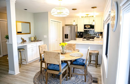 Ocean Ridge Condo | Golf course adjacent, beach-themed condo with sunroom, washer/dryer, & AC