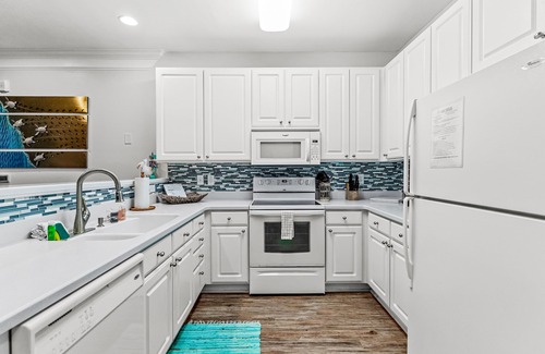 Calabash House | Golf-course-front villa at Crow Creek with screened porch and washer/dryer