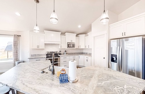 Sweetwater House | Golf course home with lake views, WiFi, deck & patio, shared pools & hot tub