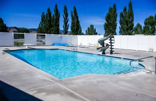 Sweetwater House | Golf course home with lake views, WiFi, deck & patio, shared pools & hot tub