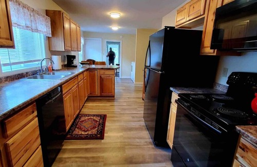 Greenville Junction Apartment | Good Vibes Lodge- *Direct ATV & Snowmobile Access*