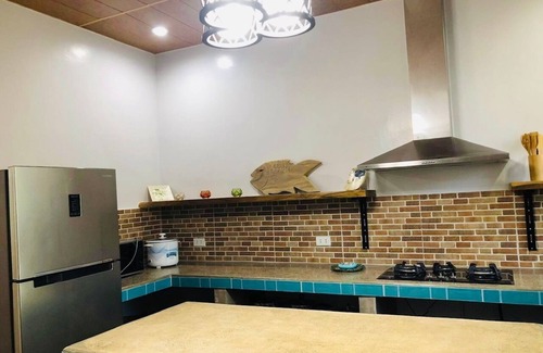 Samal House | Gorgeous Samal Island Home with pool, basketball court - near Ferries & resorts!
