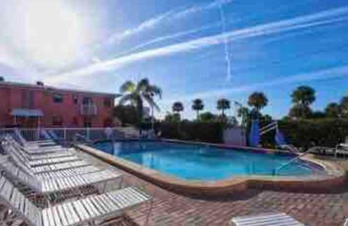 St. Pete Beach Apartment | Gorgeous Beach view balcony with heated pool