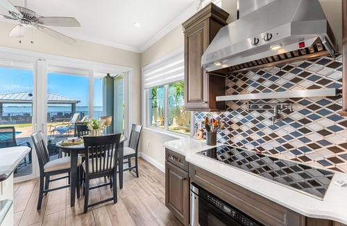 Cocoa Isles Country Club House | Gorgeous Direct Riverfront Pool Home W/Private Balcony, Movie Room, & Fire Pit!