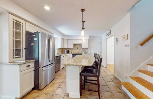 Sandwich House | Gorgeous dog-friendly home with private, heated pool, furnished patio, porch