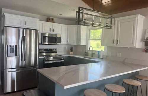 Horicon House | Gorgeous Lakefront Retreat with Waterside Bar Area