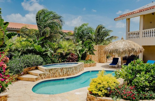 Bubali Apartment | Gorgeous modern 1-bedroom apartment with tropical garden, pool and whirlpool