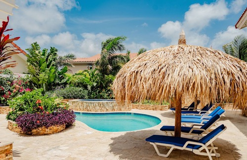 Bubali Apartment | Gorgeous modern 1-bedroom apartment with tropical garden, pool and whirlpool