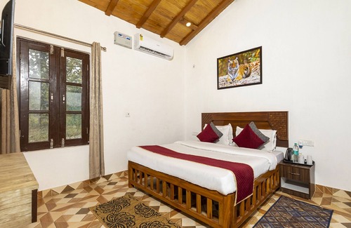 Bail Parao Hotel | Goroomgo Mid Forest House Kalaguri