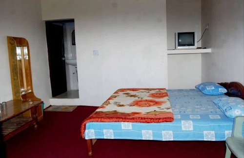 Kausani Hotel | Goroomgo Snow View Guest House Kausani