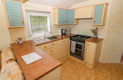 Cemaes Bay Cottage | GORPHWYSFA CARAVAN, pet friendly, with a garden in Cemaes Bay