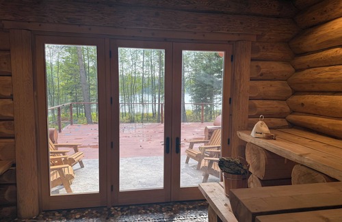 Blakeslee Cabin | Grand opening Lakefront Log Cabin, steam room, sauna, professional karaoke.