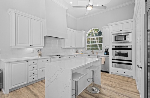 Coquina Sands House | Grandiose home with tropical private pool area & jetted tub