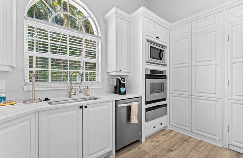 Coquina Sands House | Grandiose home with tropical private pool area & jetted tub