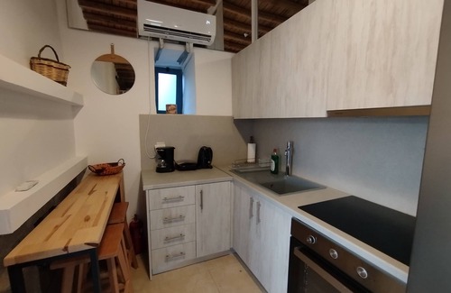 Lagoudi Zia Apartment | Grandpa's place - a 150year-old stone built house- near Zia's sunset balcony