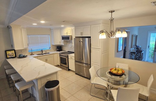 Naples Park House | Great Home, Amazing Pool Oasis, Super Close to Beach, FREE Bikes, Full Amenities