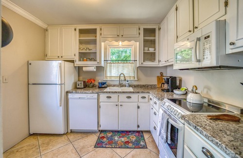 Harrison House | Great location just two minutes from downtown square with a Hot Tub!