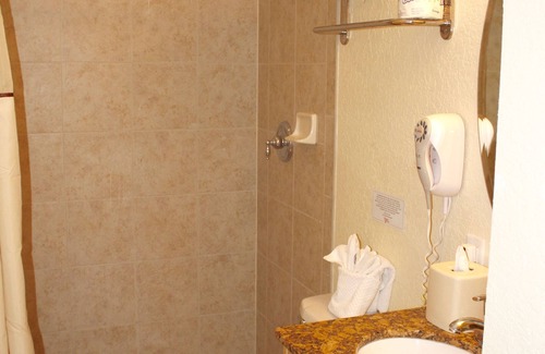 Treasure Island Hotel | Great Relaxing Overnight Stay! 4 Relaxing Units, Free Parking, Pool