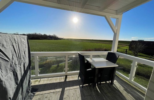 Wremen Apartment | Great vacation apartment with sauna, south-facing balcony, beach chair and beautiful