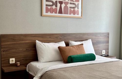 Gonio Apartment | Greenside Emerald Apartment by brege