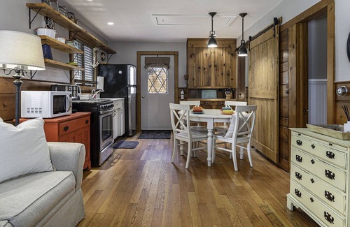 Indian River Cottage | Greet the morning sun with a view of the clear-flowing Indian River right outside the door