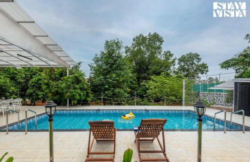 Karjat Villa | Grey Hues with Swimming Pool & Lawn at Karjat by StayVista