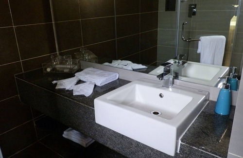 Mylapore Tiruvallikk Hotel | Grey Suit