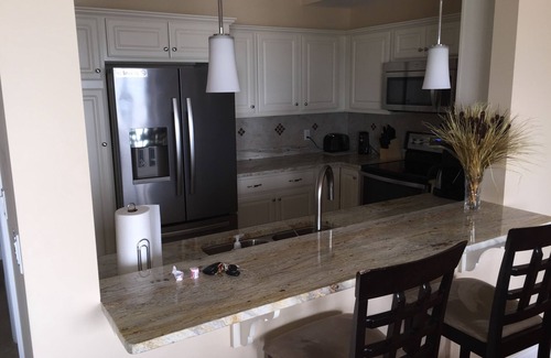 Geneva-on-the-Lake Condo | Ground Floor Lakefront Condo- Indoor Pool, Private Beach, Balcony