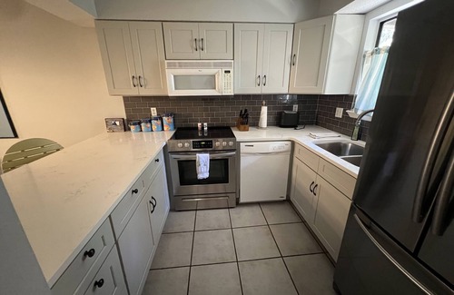 West Panama City Beach Resort | Ground floor condo with great pools and across from white sand beaches!